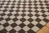 Geometric ivory and chocolate brown checkered Indian Kilim rug, emulating a Navajo weave.