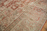 Distressed Heriz carpet with geometric arabesques and classic turtle design border.
