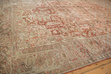 Distressed vintage Heriz carpet border with classic turtle design motifs in red and ivory.
