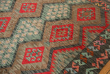 Afghani Kilim carpet section with cherry red serrated palmettes and dusty blue floral gul.
