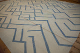 Contemporary abstract Afghani Kilim with ivory flat weave and pale denim blue geometric lines.
