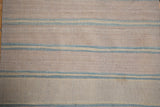Afghani Kilim runner's hand woven texture with pale denim blue and ivory stripes.
