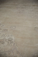 Textured ivory and platinum pile of a vintage distressed Sparta carpet with tone-on-tone floral motifs.
