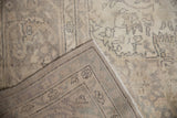 Painted numbers on the reverse foundation of the distressed vintage Sparta carpet.
