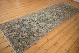 Distressed vintage Malayer runner with faded palmettes and serrated leaves in dusty slate and ivory.