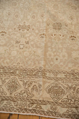 Distressed Vintage Bijar carpet's ornate border, field with faded floral palmettes and abrashes.