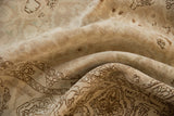 Textured vintage Distressed Bijar carpet, highlighting beige tones, palmette vinery, and natural abrashes.