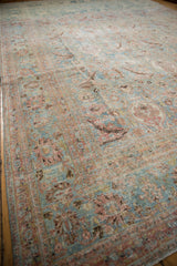 Khorassan rug with distressed powder blue field, faded blush floral patterns, and visible foundation.