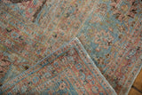 Distressed Khorassan carpet corner, showing worn pile, exposed foundation, and selvages.