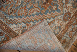 Close-up of distressed Borchalou rug pile and visible hand-knotted foundation with intact selvage.