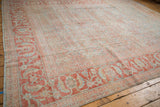 Distressed Mahal carpet border, pale cherry red with powder blue serrated leaves and floral design.
