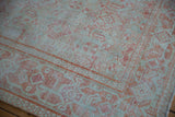 Low pile of a vintage Mahal rug with visible knot heads in seafoam and terracotta.