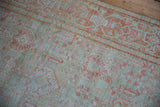 Detailed texture of a vintage Mahal rug with visible wear to the foundation and knot heads.
