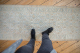 Soft ivory and powder blue distressed geometric pattern on vintage Malayer runner.