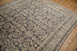 Distressed texture and faded Herati motif with vinery on a vintage Sparta rug.