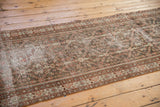 Distressed vintage Mahal runner detail: madder root rust, ivory trellis pattern, visible foundation.