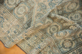 Distressed Malayer runner showing faded denim blue, beige, and charcoal Herati patterns.