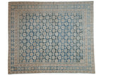 Vintage Distressed Mahal carpet, playful blue and ivory patterned floral and animal motifs.