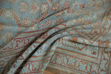 Softly draped vintage Malayer carpet highlighting its pliable texture and low, even pile.
