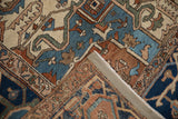 Antique Serapi rug corner revealing intricate pile, robust foundation, and secured edge.