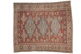 Antique distressed Soumac carpet, triple medallions, faded red and pale blue.