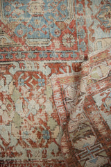 Distressed antique Caucasian Soumac carpet with areas of exposed foundation and visible woven backing.