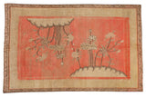 Antique Khotan carpet with blush pink field, ivory border, asymmetric pictorial blossoms from mounds.