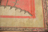 Antique Khotan carpet: pink, ivory, brown landscape design, mostly even wear.