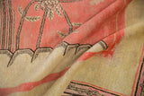 Antique Khotan rug detail: blush floral pile with mostly even wear and ivory woven back.