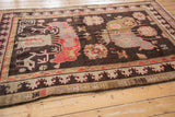 Pictorial motifs of stylized animals and flowers in chocolate, peach, mauve colors.