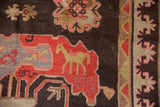 Pictorial vintage Khotan carpet detail with peach horse motif on red and chocolate brown.