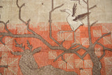 Uzbeki Khotan pictorial rug with bird, deer, tree branches, snowflake patterns, terracotta and beige.