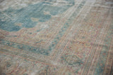 Vintage Distressed Khorassan carpet with prominent wear showing visible foundation.
