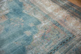 Distressed vintage Khorassan carpet with exposed foundation, faded powder blue, and beige.