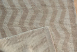Distressed Tulu rug runner pile with geometric pattern, visible foundation, and reverse weave.