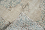 Vintage Sparta rug's distressed pile revealing foundation and hand-knotted reverse.