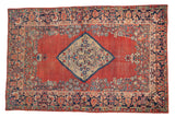 Vintage Arak rug: brick red abrashed field, ivory diamond floral medallion, navy vine border.