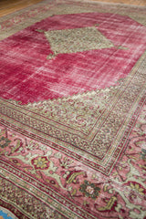 Distressed ruby red Doroksh carpet pile with intricate pawn and Samovar Turtle border patterns.