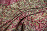 Distressed Doroksh rug's textured folds reveal raspberry red, blush, and beige tones with Herati and pawn motifs.