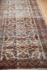 Intricate Herati pattern with distressed texture on this vintage ivory Kaisery runner.