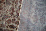 Vintage distressed Kaisery runner showing ivory Herati motif, pile wear, and reverse foundation.
