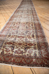 Distressed Kaisery runner with softened allover Herati motif in ivory and muted red.