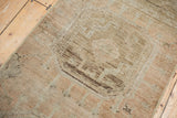Distressed Oushak rug runner, revealing faint foundation, even wear, and pale copper tones.