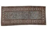 Vintage distressed Caucasian runner with dusty sky blue geometric field and faded raspberry crab border.
