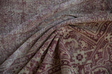 Distressed antique Amritsar rug with worn dusty raspberry and beige Mahi Mahi Herati pattern.