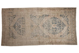 Vintage Distressed Khotan runner with faded dusty navy medallions on an antique ivory field, 6'7