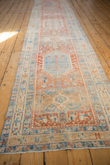 Worn fringe, distressed pile, and geometric border of a vintage Karaja runner.