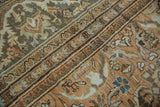 Distressed Mahal carpet: dusty rose, slate border, meandering dragon and floral patterns.