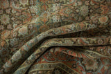 Worn texture of a vintage distressed Tabriz carpet with faded dusty teal and terra cotta Herati design.