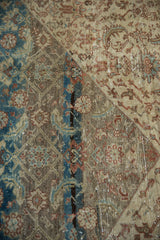 Distressed Malayer carpet pile showing faint foundation, rich abrash, and Herati motifs.